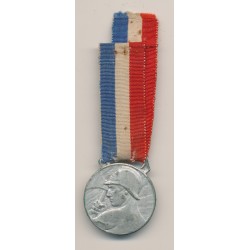 Médaille - Oeuvre des pupilles - Pompier avec hache