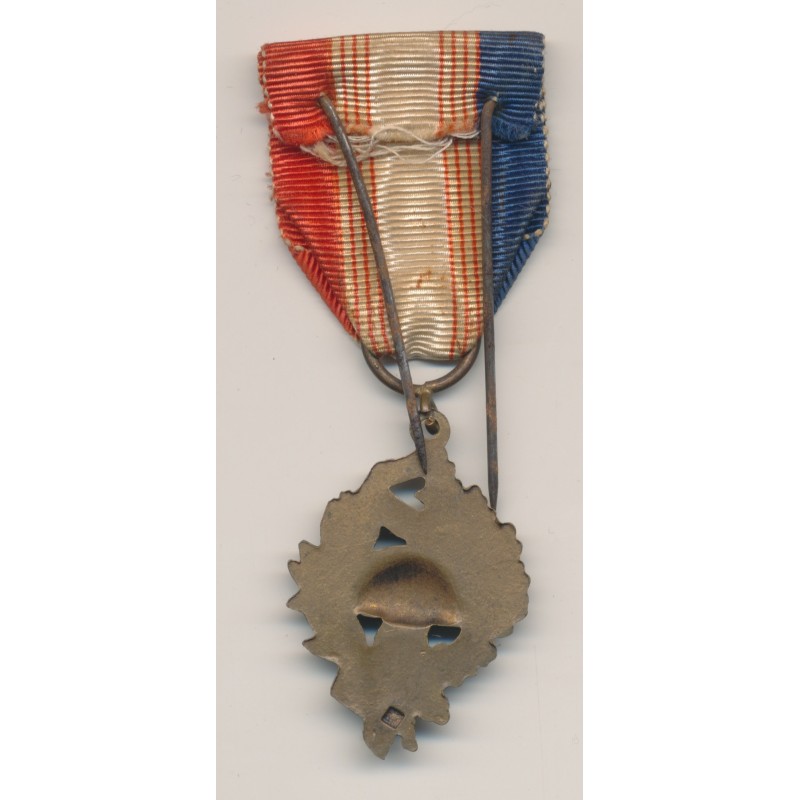 Médaille - Union nationale des combattants - revers avec poinçon