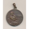 Médaille - Joueur de cornemuse et femme - bronze - 33,5mm - TTB